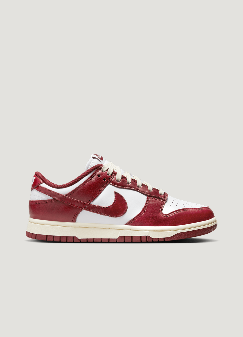 WOMEN’S NIKE DUNK LOW ‘TEAM RED’