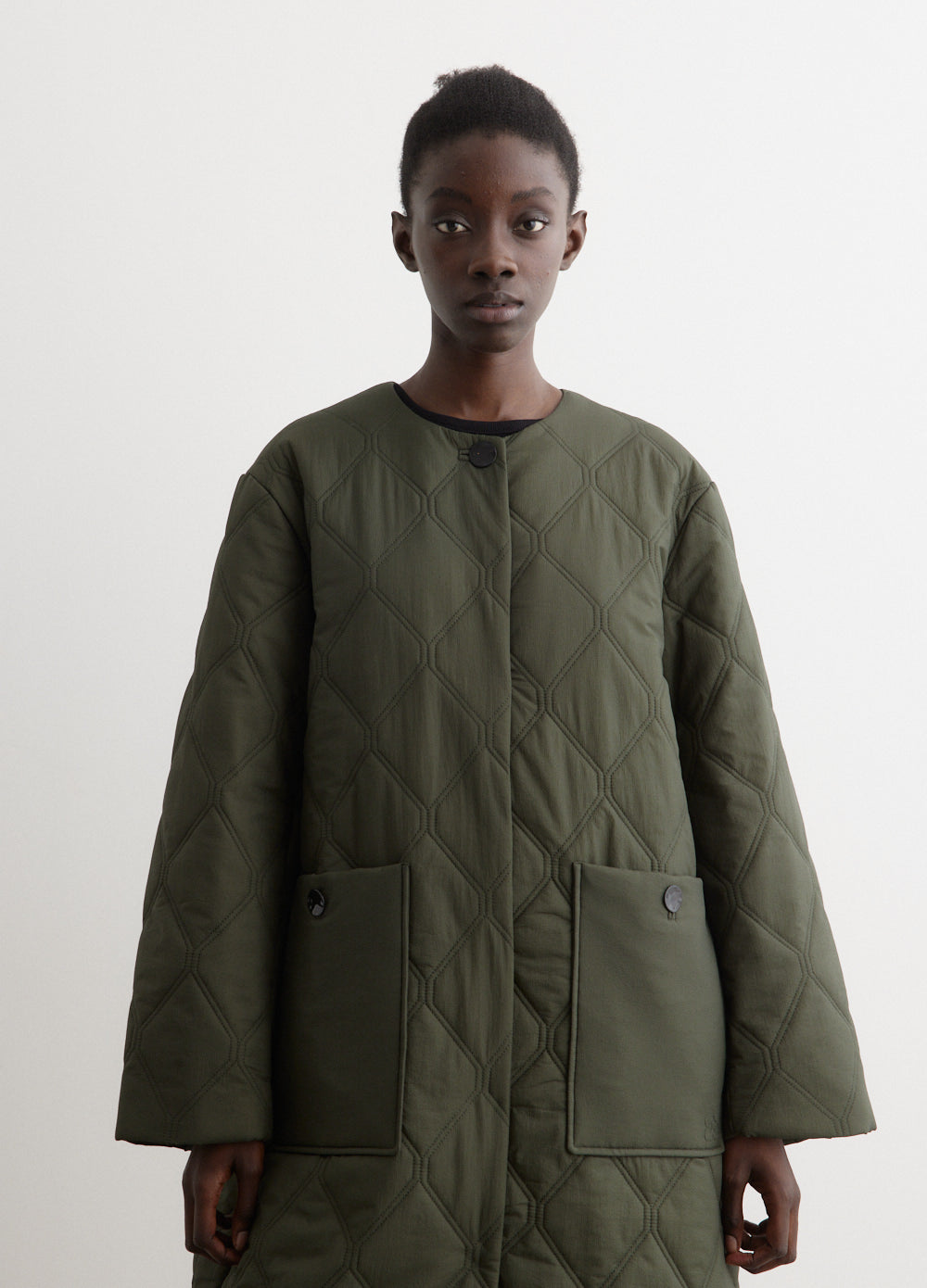 Long green quilted coat on sale