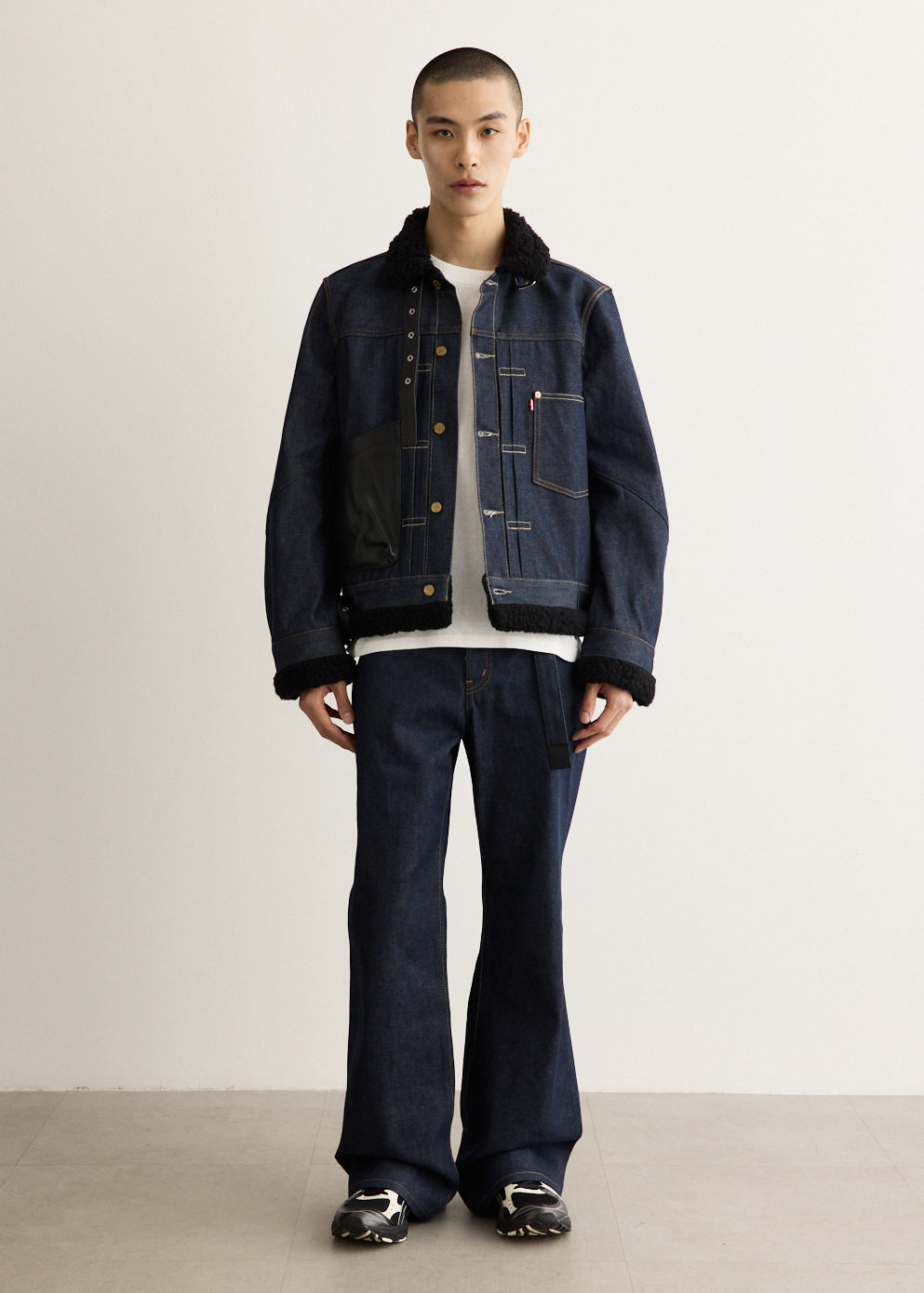 x Sacai Belted Flare Pants