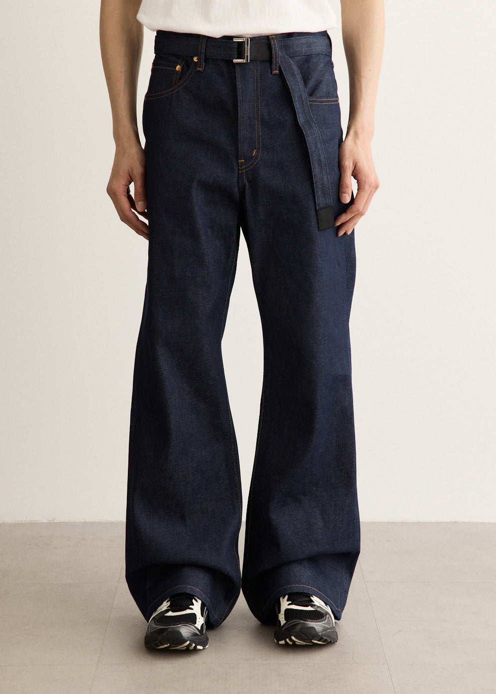 x Sacai Belted Flare Pants