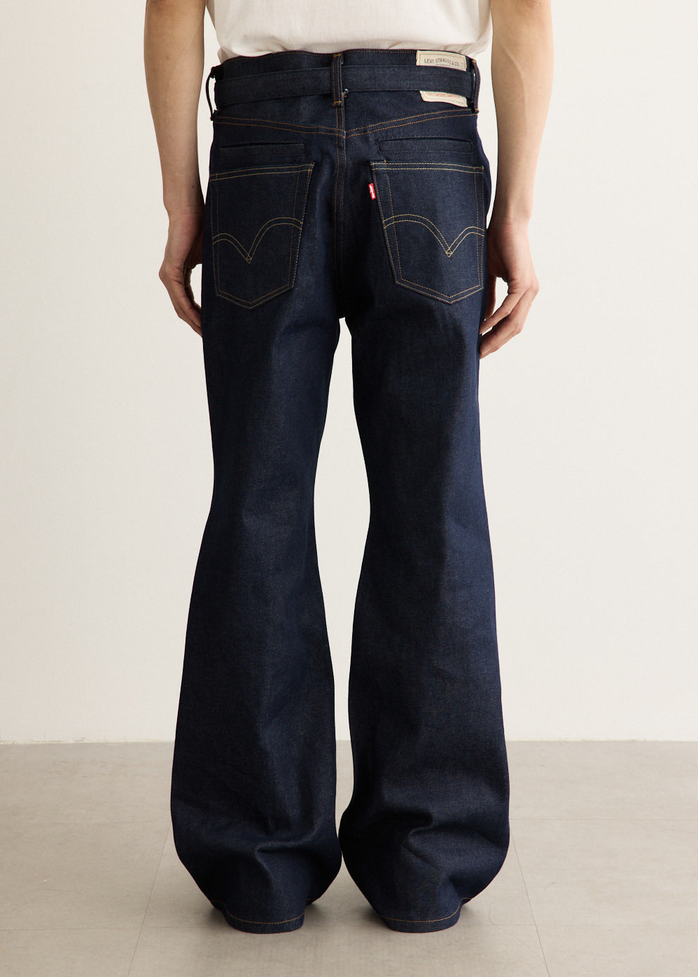 x Sacai Belted Flare Pants