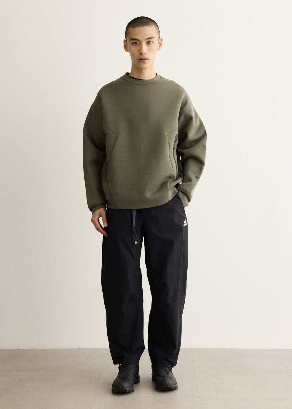 x NOCTA Trapeziud Cut Crew Sweater