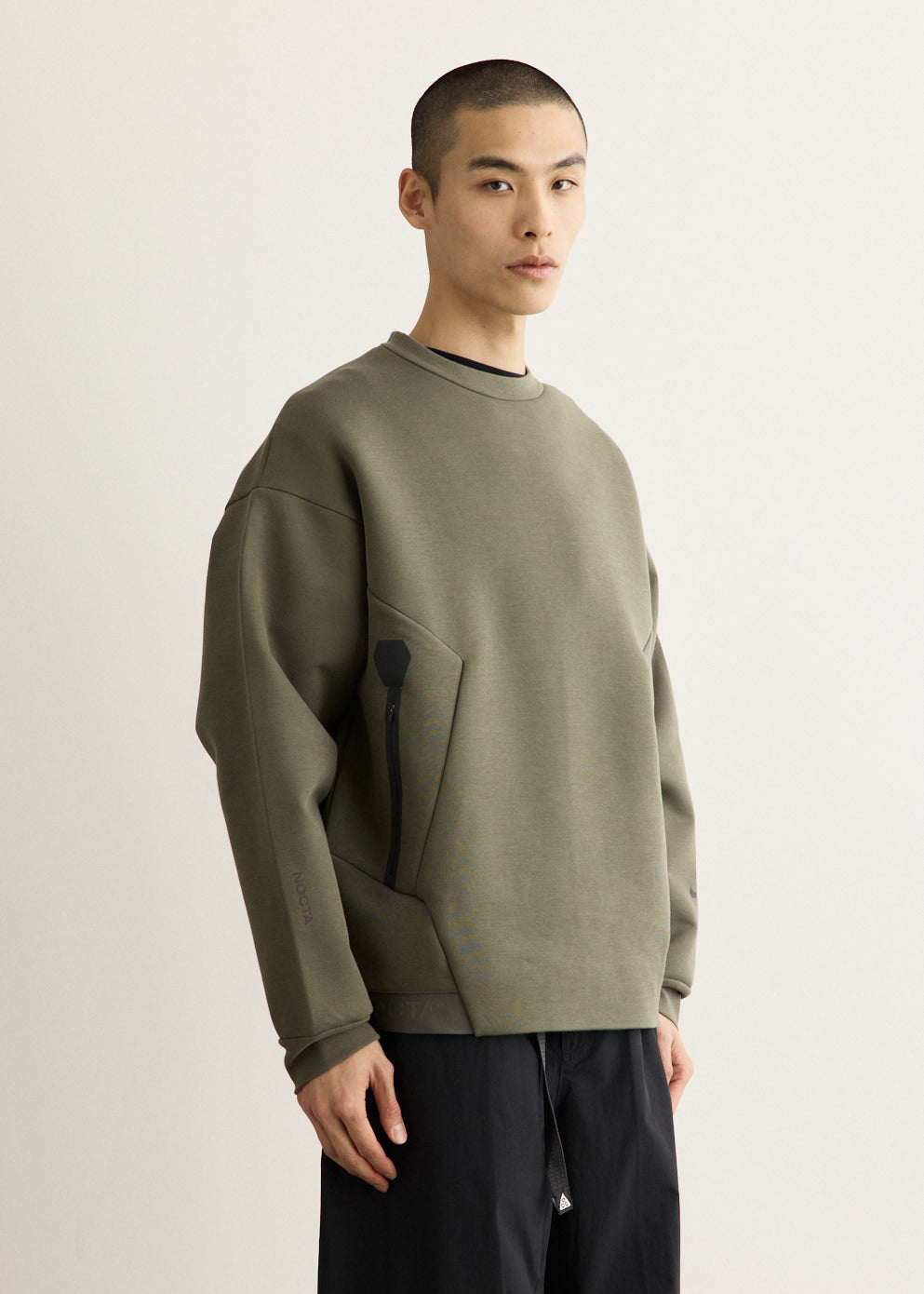 x NOCTA Trapeziud Cut Crew Sweater