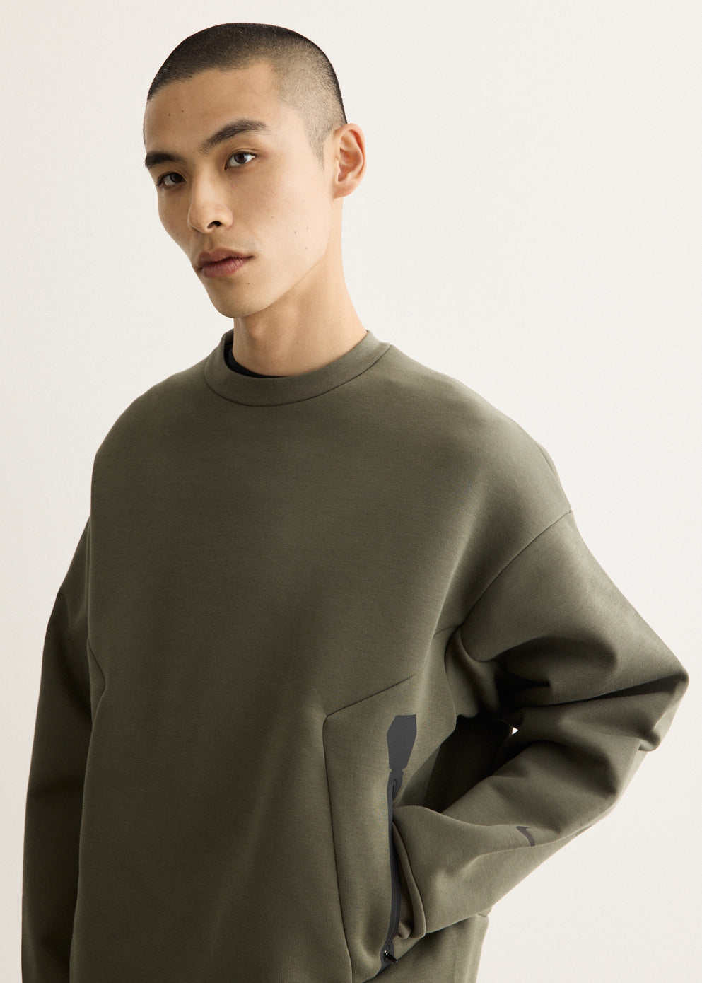 x NOCTA Trapeziud Cut Crew Sweater