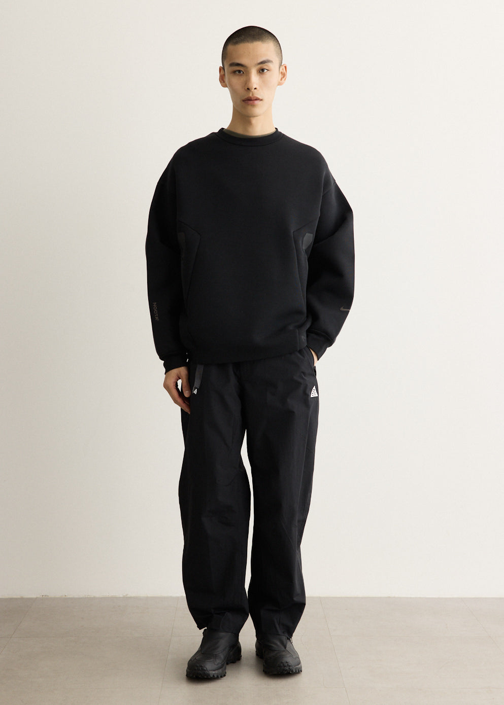 x NOCTA Trapeziud Cut Crew Sweater