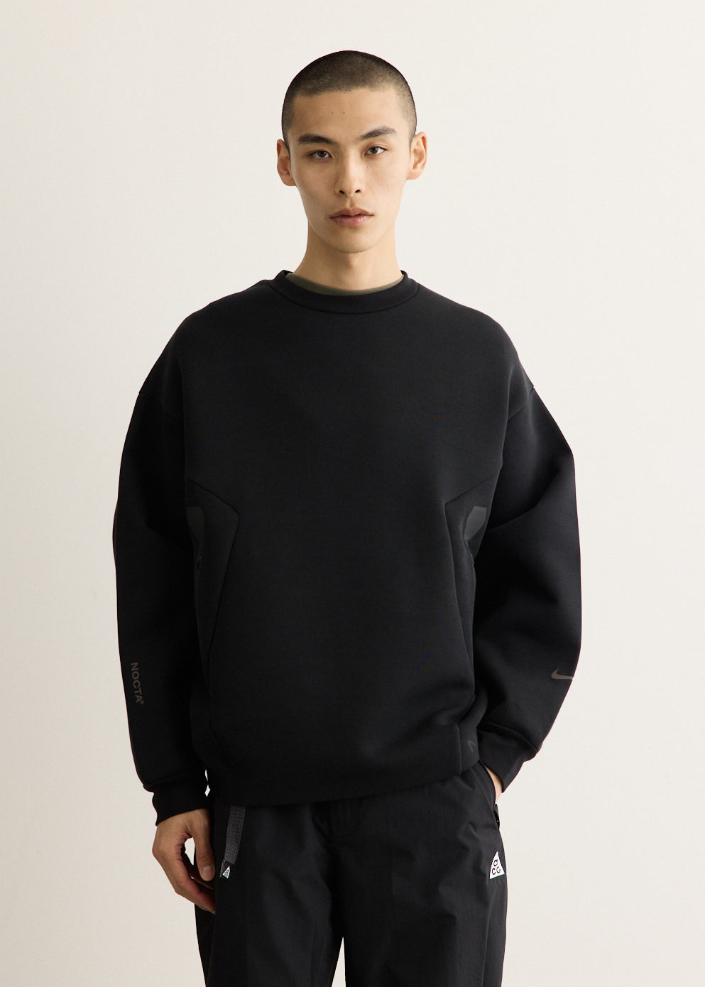 x NOCTA Trapeziud Cut Crew Sweater