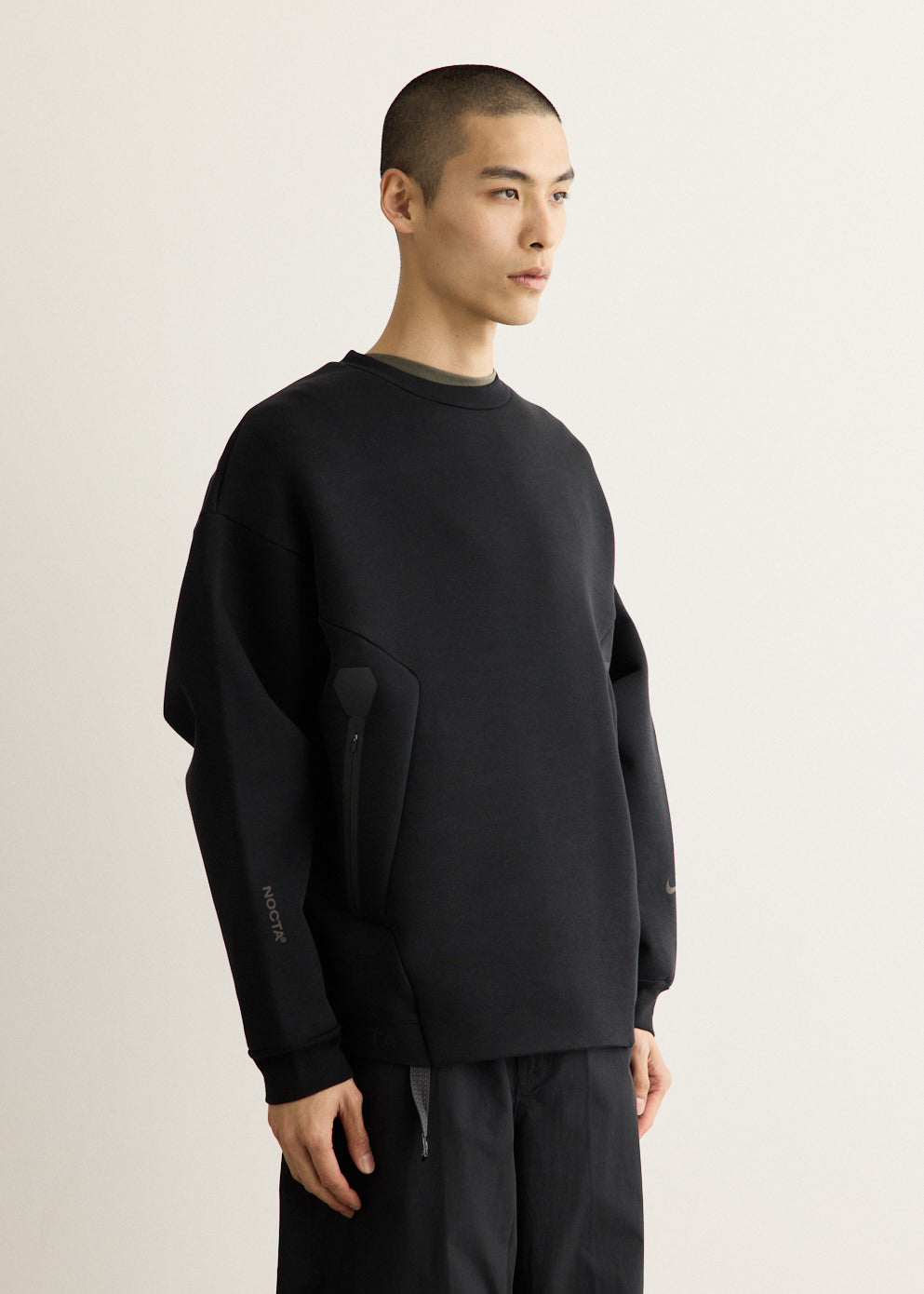 x NOCTA Trapeziud Cut Crew Sweater