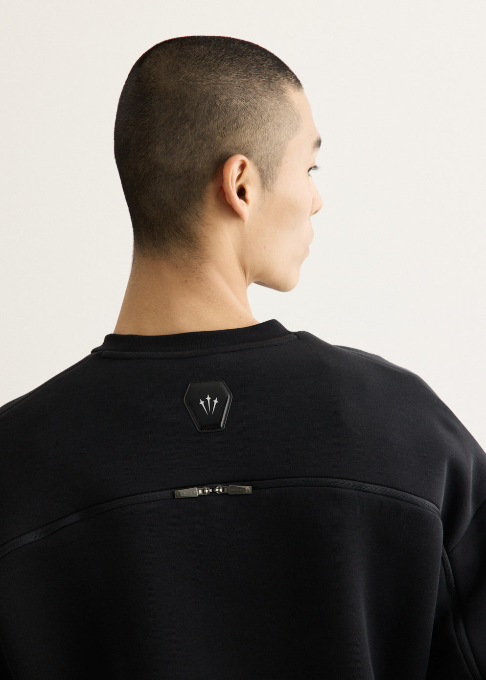 x NOCTA Trapeziud Cut Crew Sweater