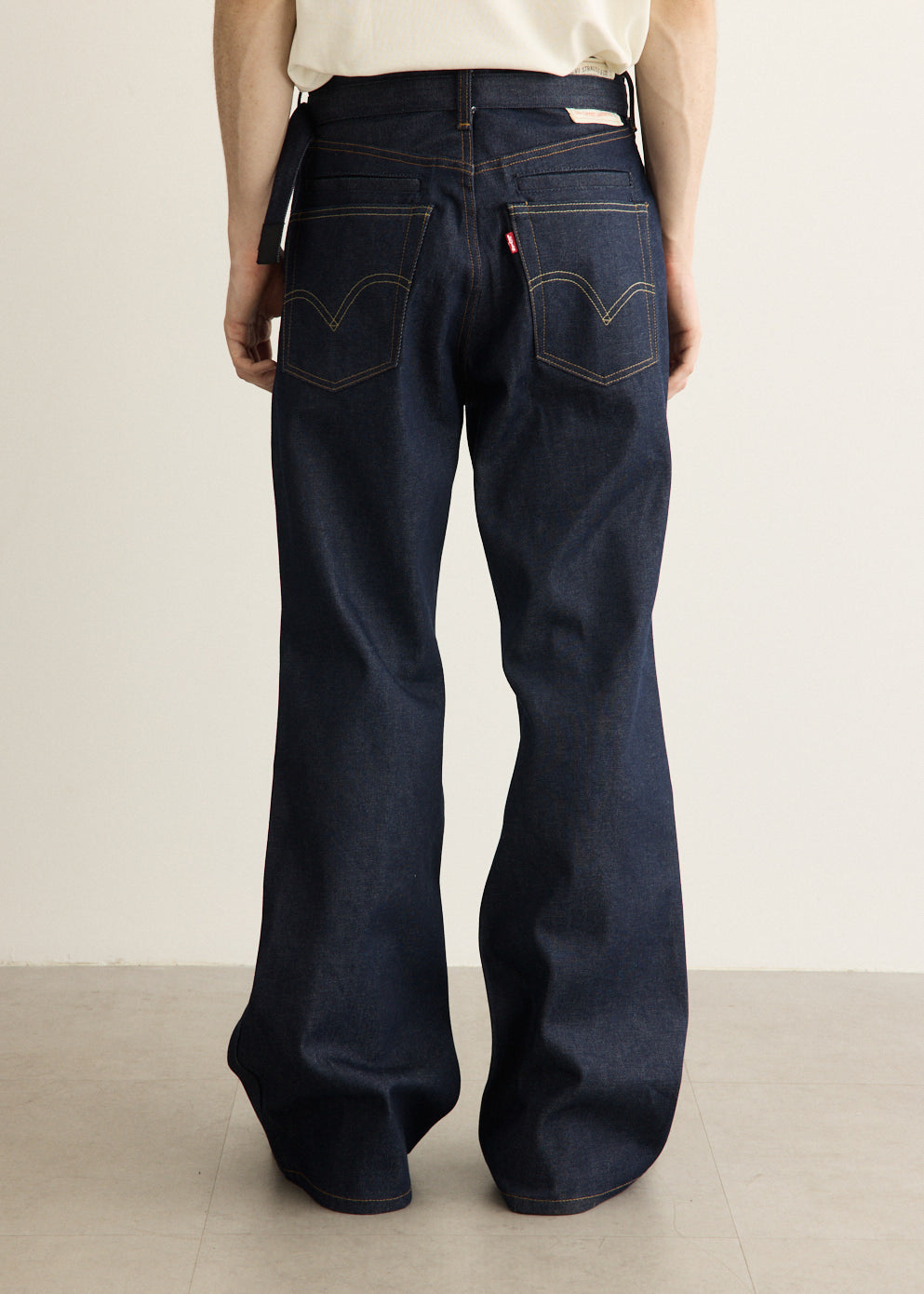 x Sacai Belted Flare Pants