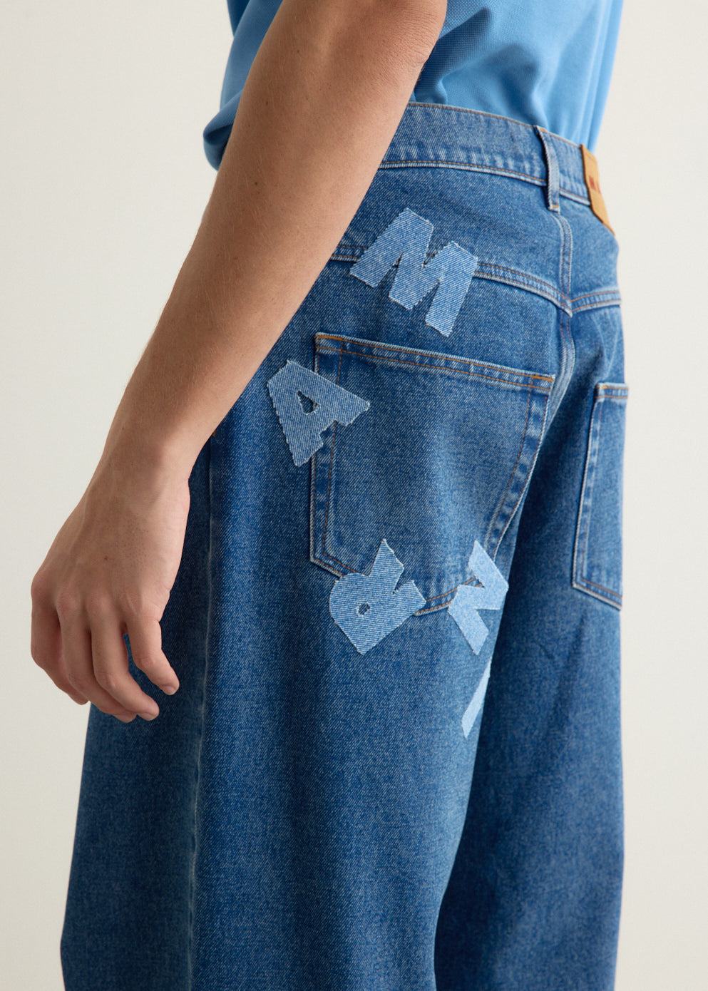 Bleach Coated Logo Lettering Jeans