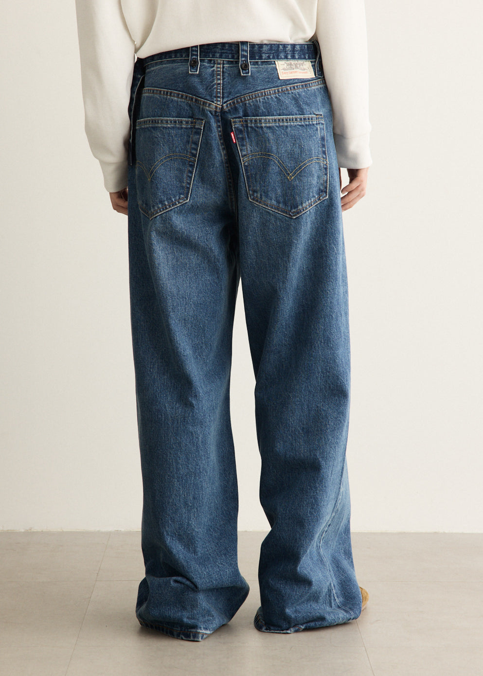 x Sacai Belted Wide Pants