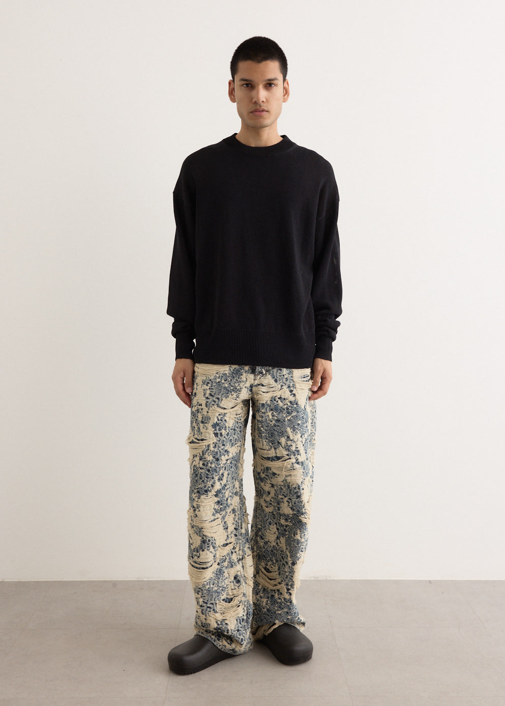 1981U Distressed Monogram Denim Jeans