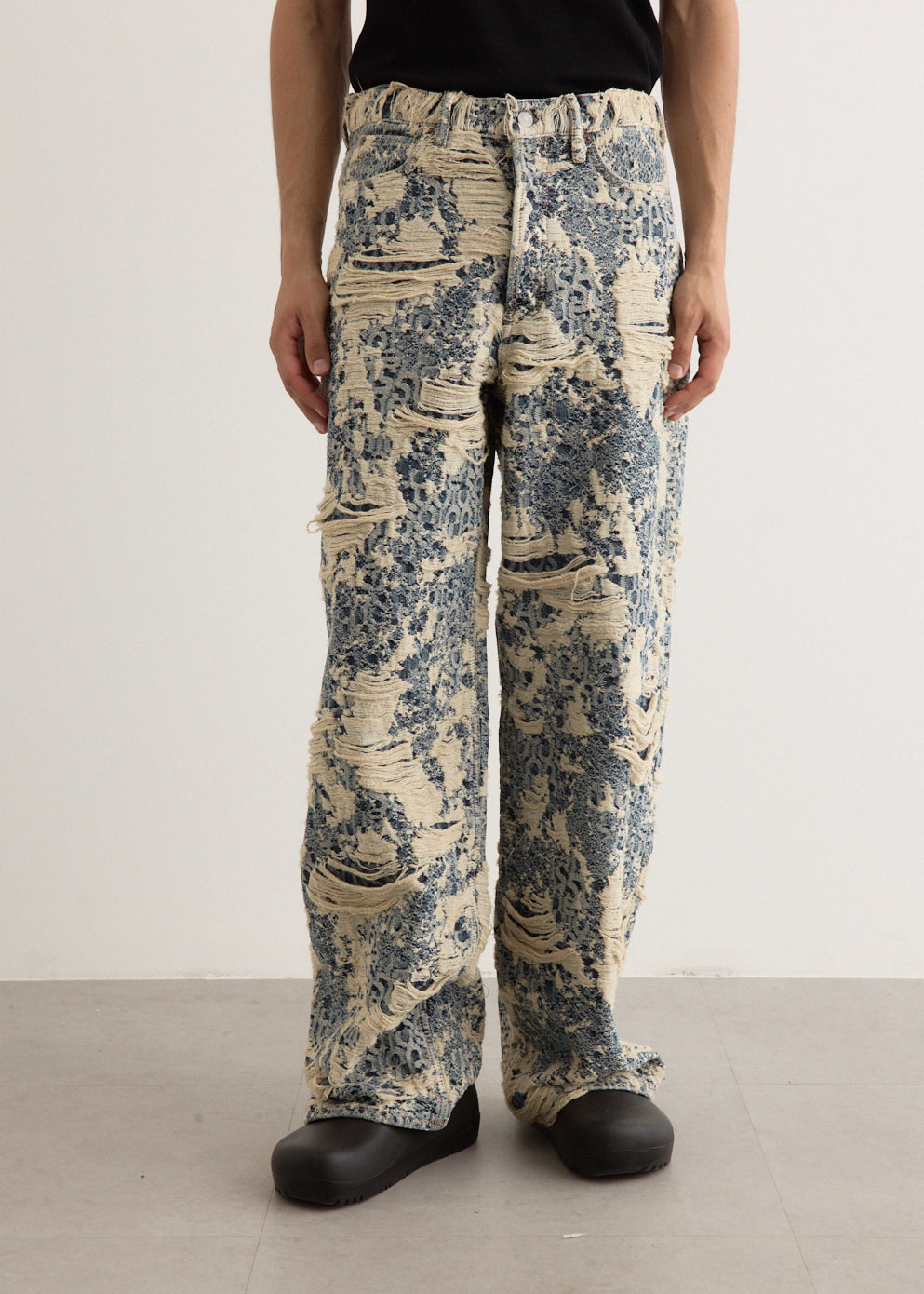 1981U Distressed Monogram Denim Jeans