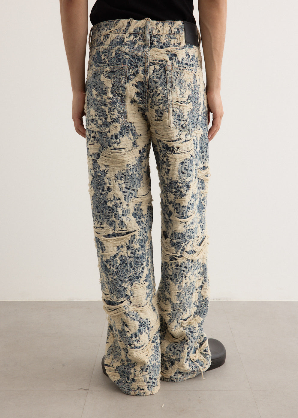 1981U Distressed Monogram Denim Jeans