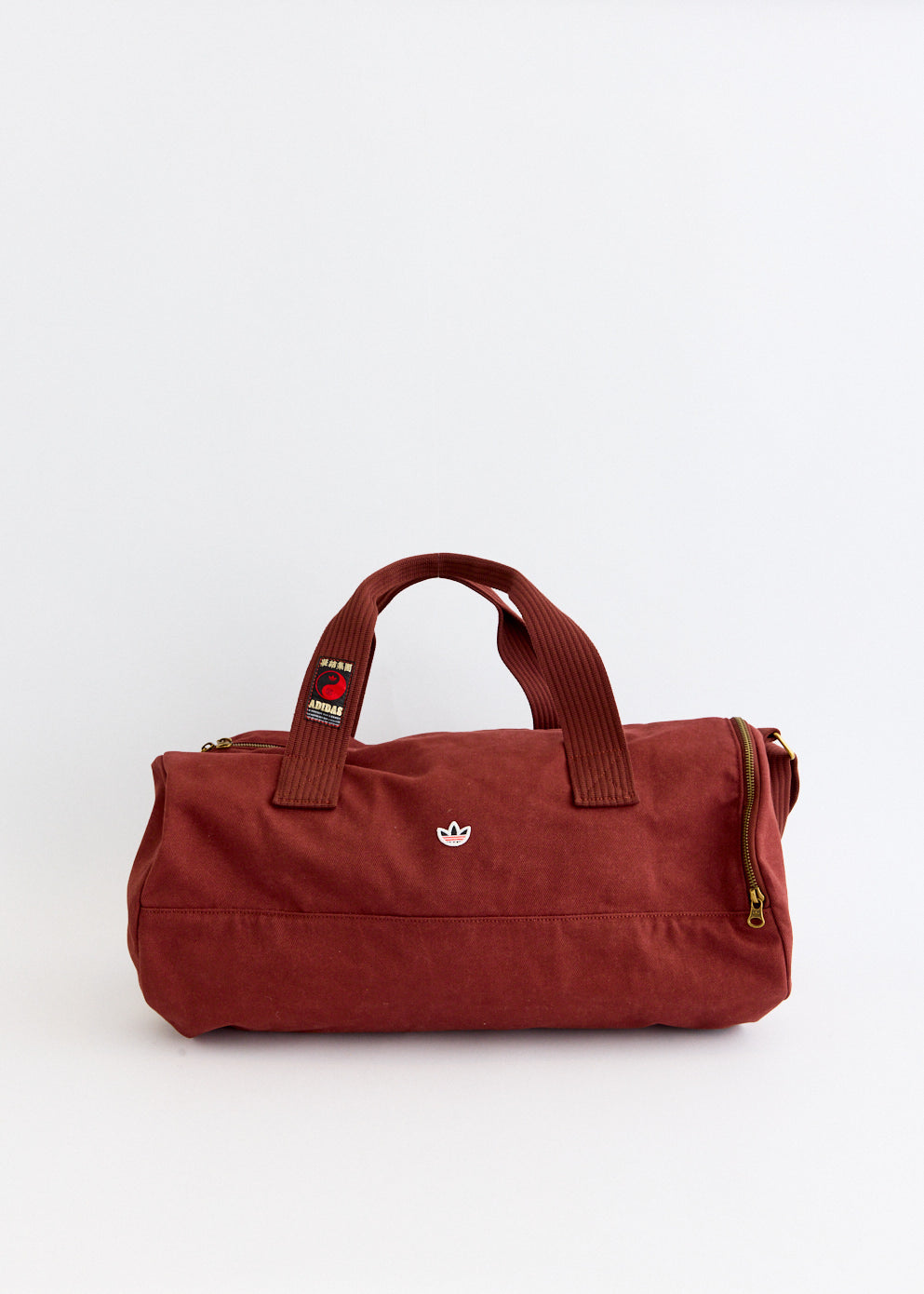 x CLOT by Edison Chen Barrel Bag