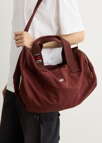 x CLOT by Edison Chen Barrel Bag