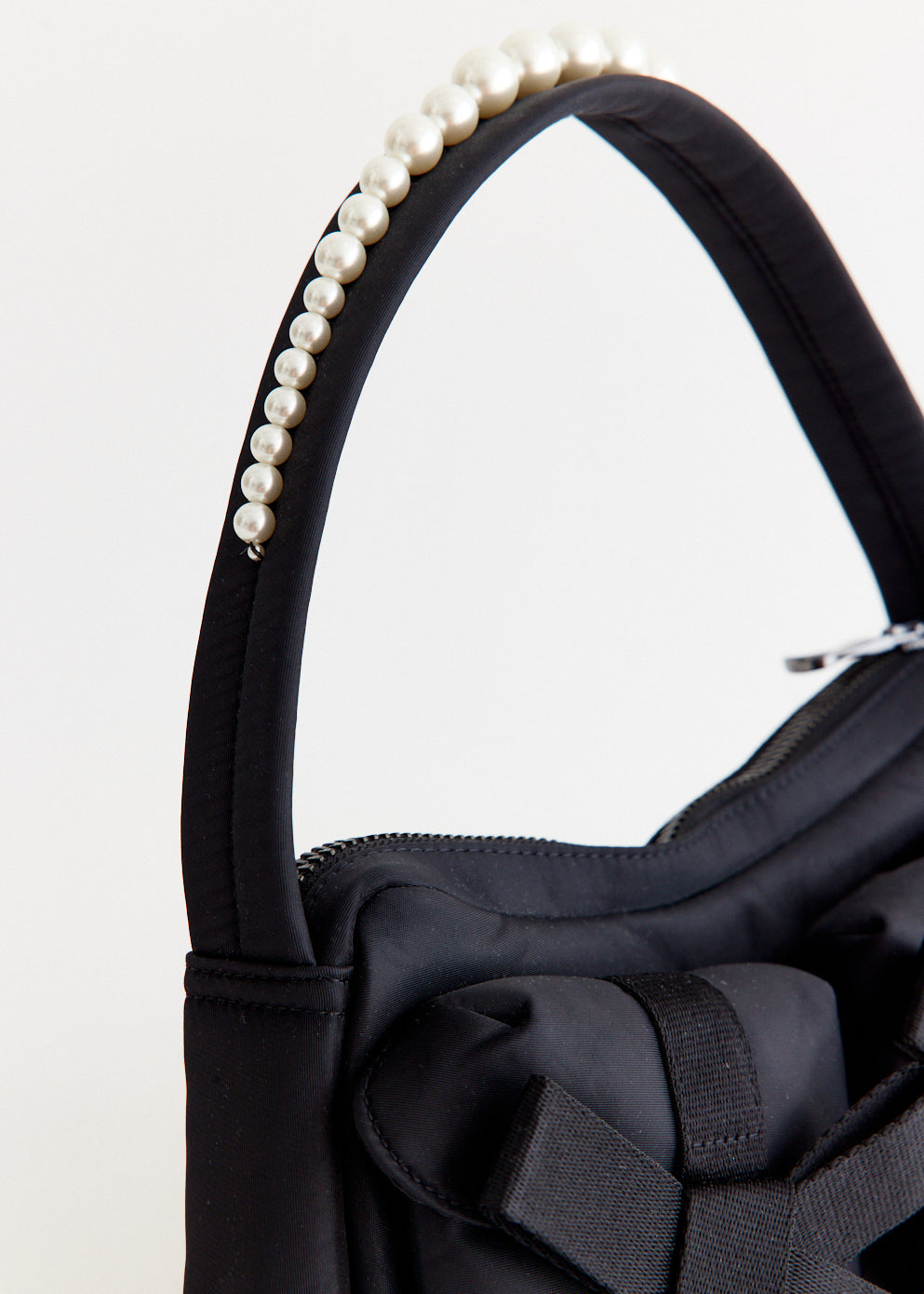 Utility Bow Pocket Pochette Bag