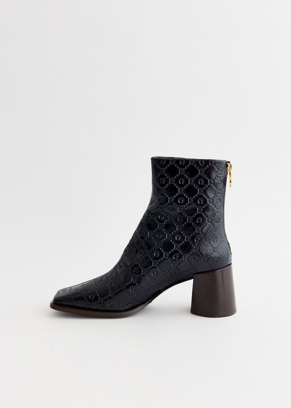 Moonogram Embossed Leather Block Boots