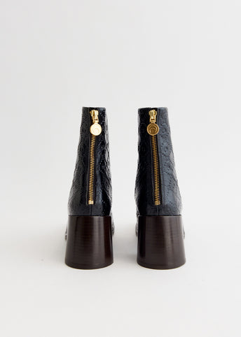 Moonogram Embossed Leather Block Boots