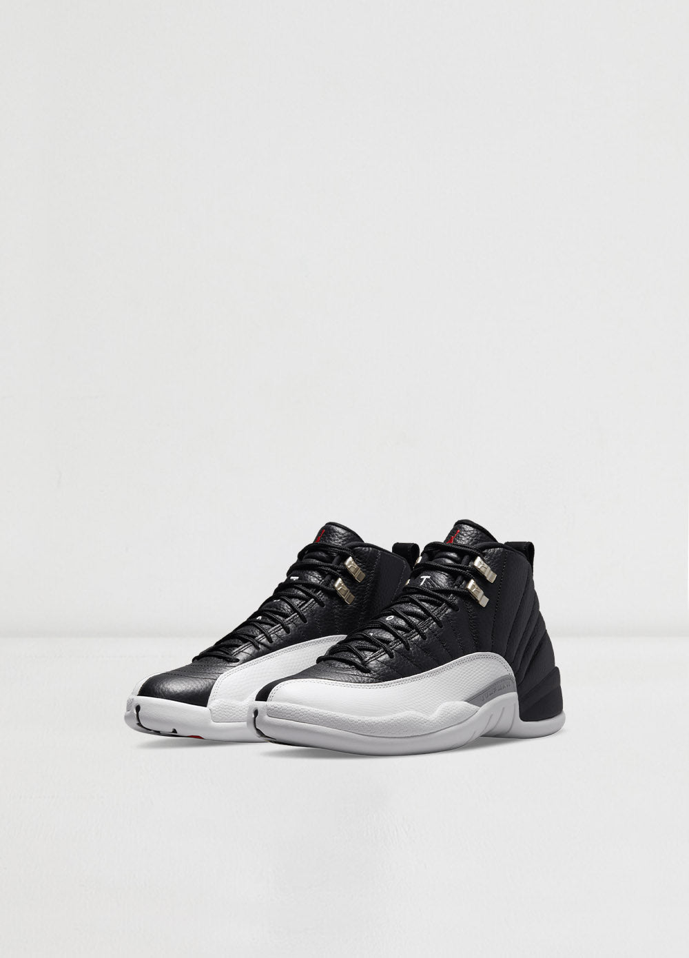 Black and white jordan 12 playoffs hot sale