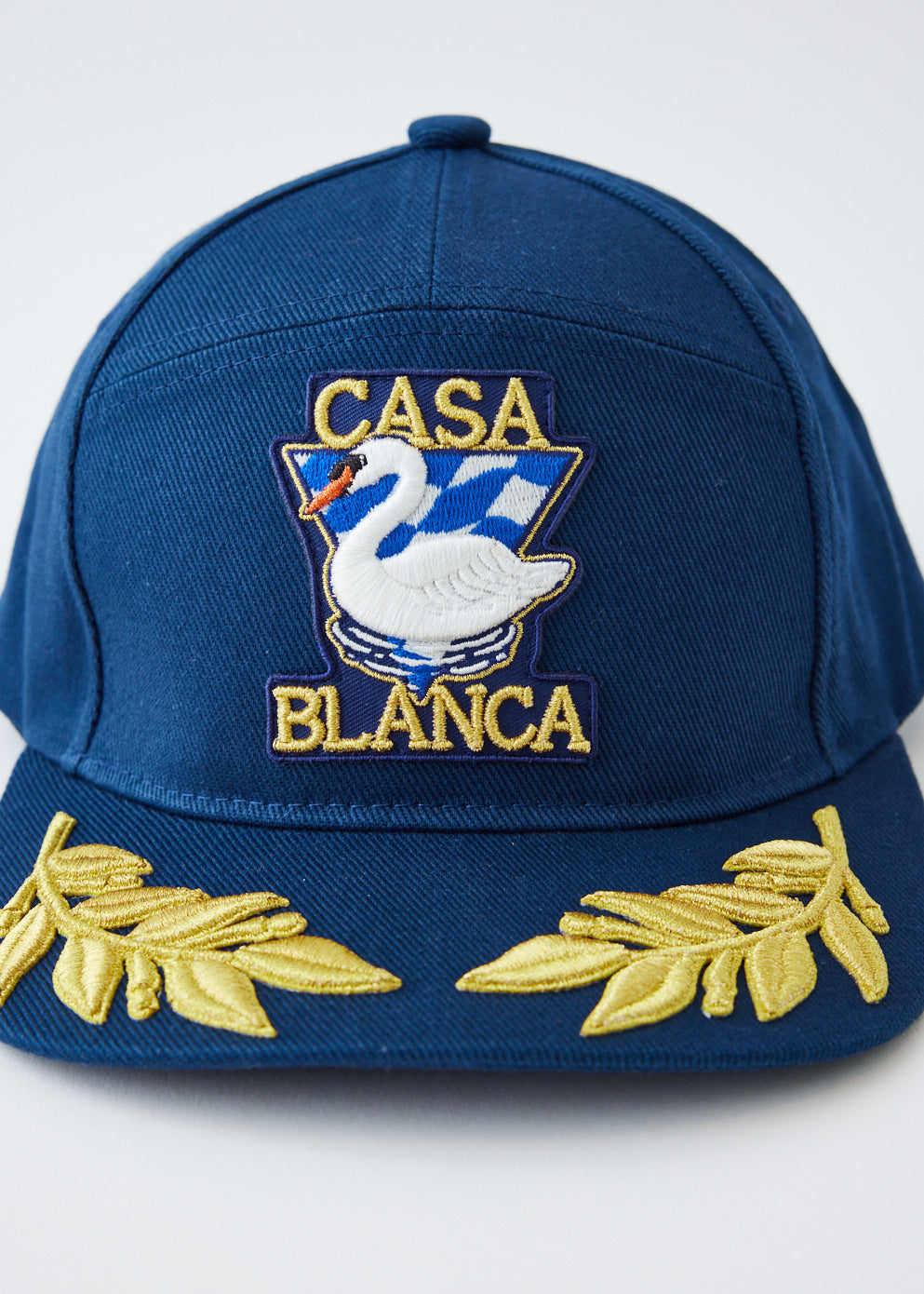 Par Avion Laurel Cap