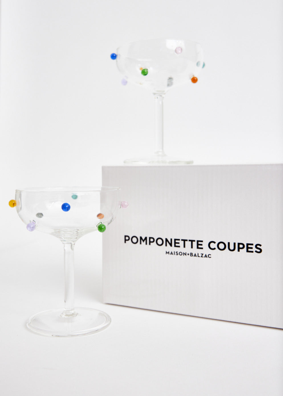 Two Pomponette Coupes Glasses